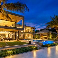Modern Exterior With Brightly Lit Backyard