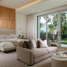Neutral Contemporary Bedroom With Tan Sofa