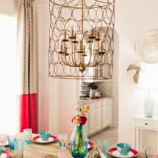 Eclectic Dining Room With Blue Vase