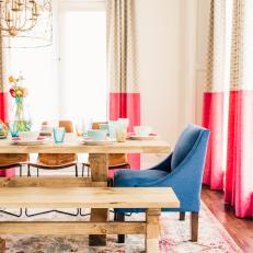 Eclectic Dining Room With Blue Armchair