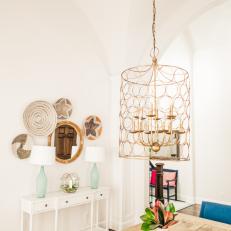 Eclectic Dining Room With Blue Lamps