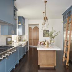 Blue Transitional Chef Kitchen With Ladder
