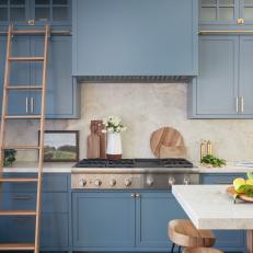 Blue Transitional Kitchen With Wood Ladder