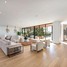 Modern Neutral Great Room With White Chairs