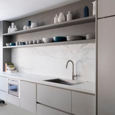Gray Kitchen With Marble Backsplash