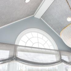 Gray Ceiling With Beaded Chandelier