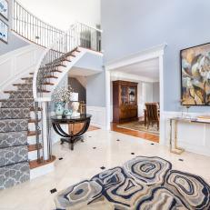 Gray Transitional Foyer With Floral Art