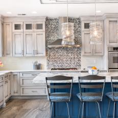 Gray Chef Kitchen With Blue Barstools