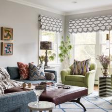 Eclectic Family Room With Green Armchairs