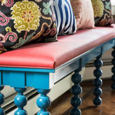 Red and Blue Banquette With Pillows