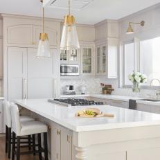 Brass-Accented, Transitional Kitchen in Soft White