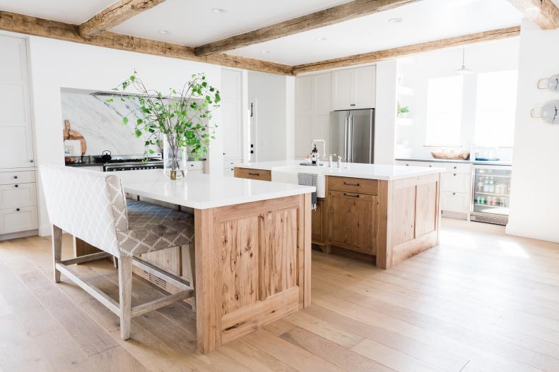 Bright Kitchen Features Double Islands and Rustic Wood Ceiling Beams