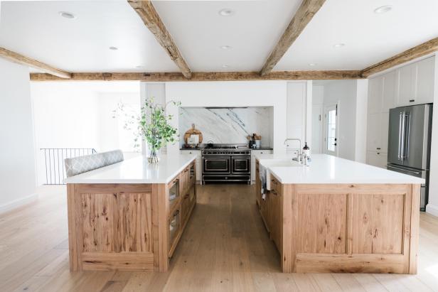 Open Concept Kitchen Features Double Islands and a Marble Backsplash