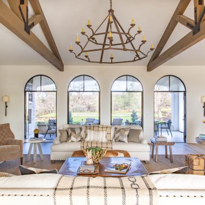 Mediterranean Neutral Living Room With Arched Windows