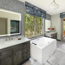 Bathroom Wows With Double Sinks and Chevron Tiled Walls