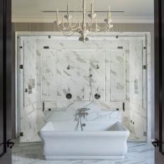 Gorgeous Marble Spa Shower With Freestanding Tub in Primary Bathroom