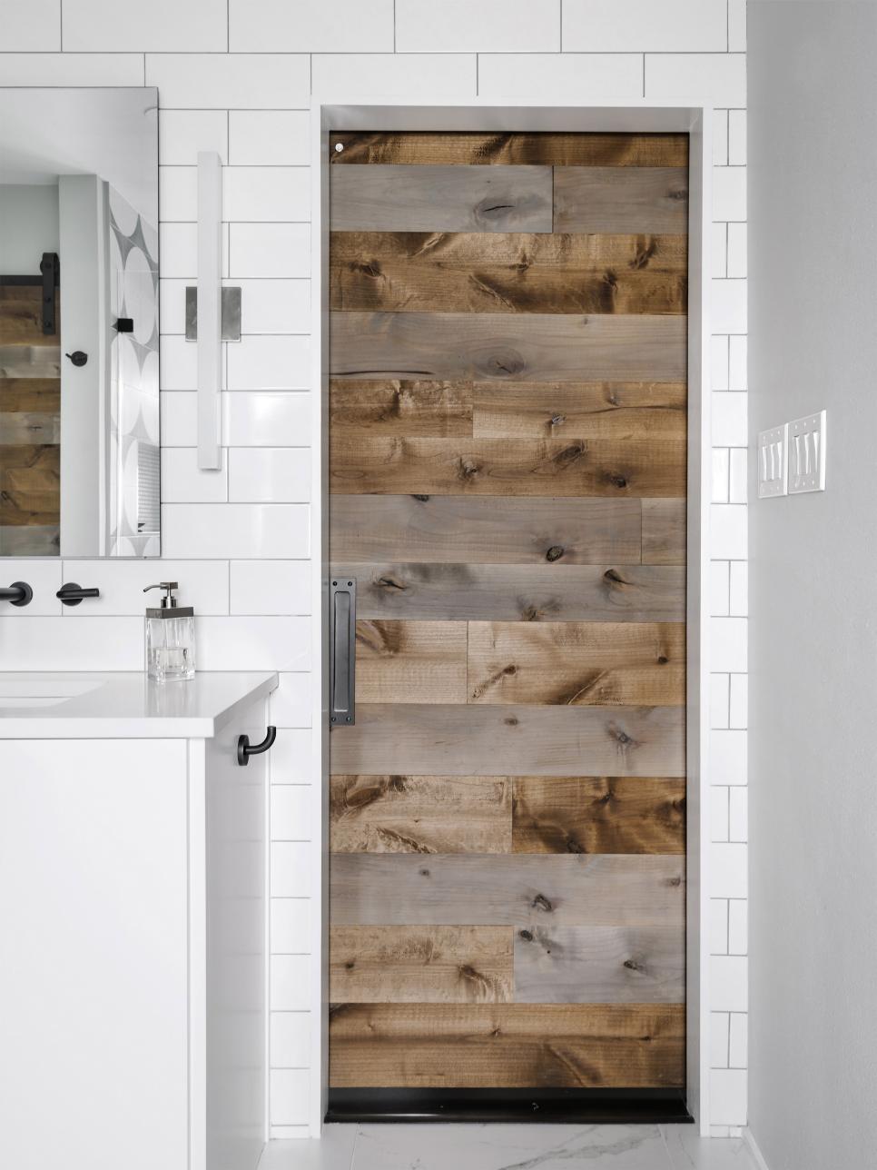 White Bathroom With Wood Door HGTV