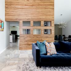 Contemporary Living Room With Partial Wood Wall