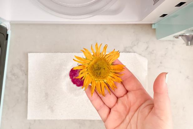 Check the flowers as you go and continue to heat them in the microwave for 30 seconds at a time until each flower is dry and looks completely flat.