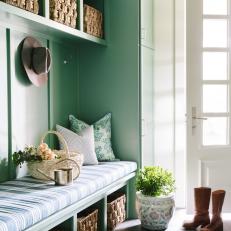 Green Cottage Mudroom With Striped Cushion