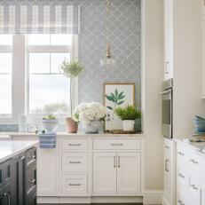 Gray and White Chef Kitchen With White Flowers