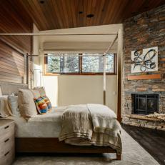 Neutral Rustic Bedroom With Canopy Bed