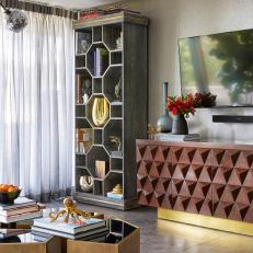 Modern Living Room Features a Geometric Credenza and Tile Flooring