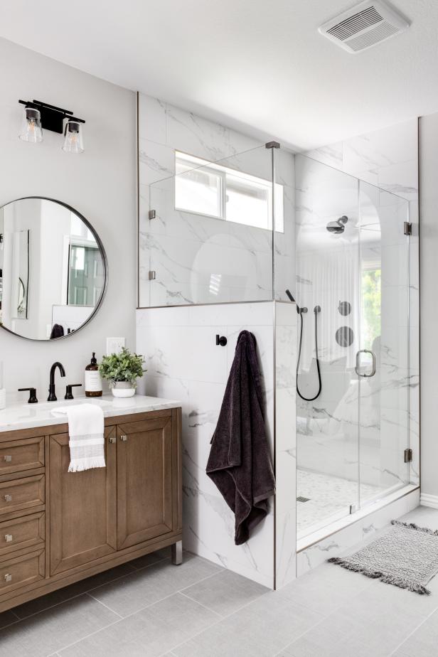 Marble Corner Shower Uses Half Wall To Share Its Light With Primary 