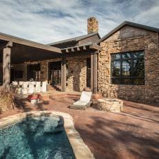 Stone Ranch House Exterior and Back Patio