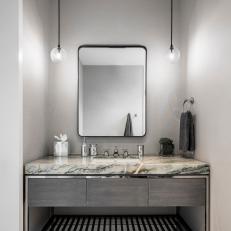 Monochromatic Bathroom With Classy Metal Accents