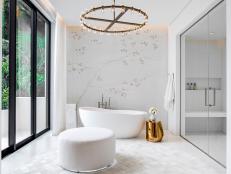 Organic Primary Bathroom Awash in Gold and White