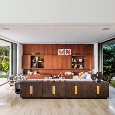 Walnut Millwork and Natural Stone in Open-Concept Living Area