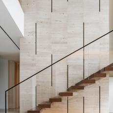 Floating Staircase Lends Drama to the Foyer
