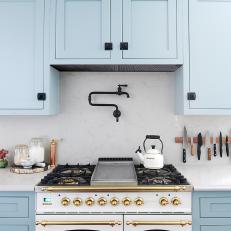 Black Metal Accents in Graceful Blue-and-Gray Kitchen