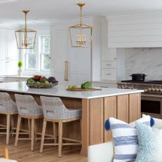 Gorgeous All-White Kitchen With Washed Wood and Mixed Metal Accents