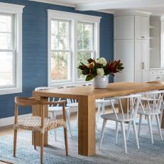 Bold Blue Grasscloth Frames Ocean Views in Dining Room
