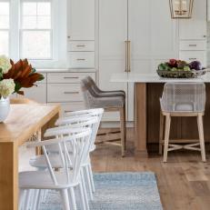 Warm Wood and Neutral Fabrics Balance White Features in the Open-Concept Kitchen