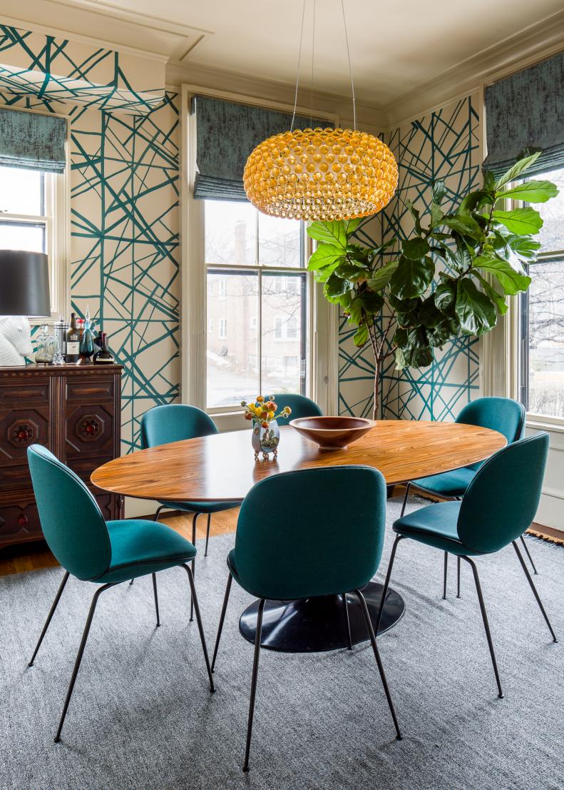 Dining Room Features a Midcentury Modern Dining Table and Chairs