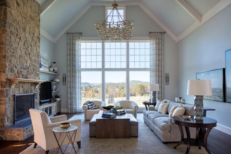 Vaulted Ceilings in Living Room With Massive Windows, Stone Fireplace