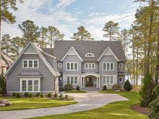 Rustic Siding on Traditional Lakefront Home, Paver Driveway, Trees