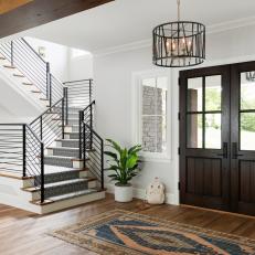 Modern Foyer With Warm Wooden Accents