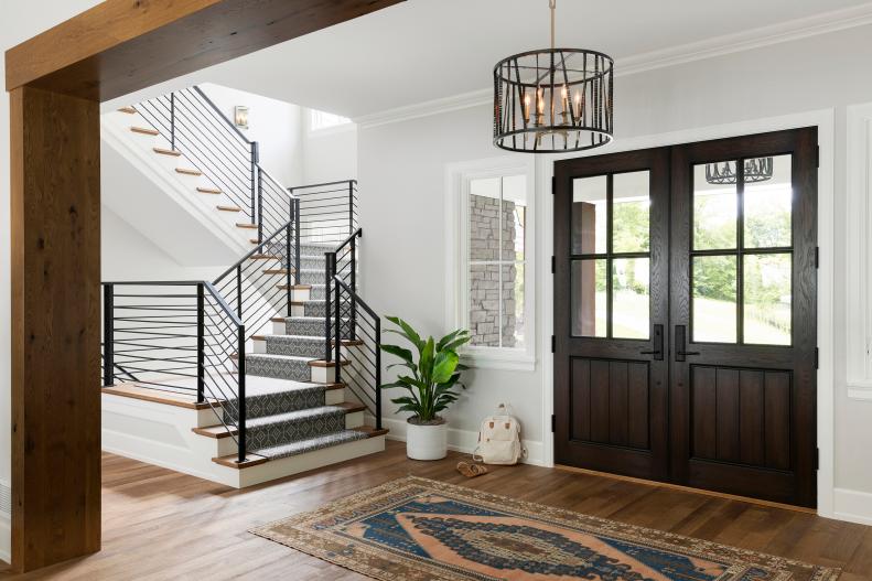 Modern Foyer With Rustic Wood Beams, Metal Staircase With Railing