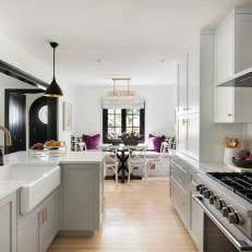 Bright White Open-Concept Living Space Puts Lighting Design in the Spotlight