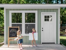 Sisters Grace and River get ready for a creative day of painting in this punchy green storage shed set up in their own backyard. Situated about 2000 feet from their main house, making a mess in here is not only care-free, it's encouraged.
