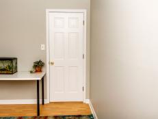 A white door in a bedroom