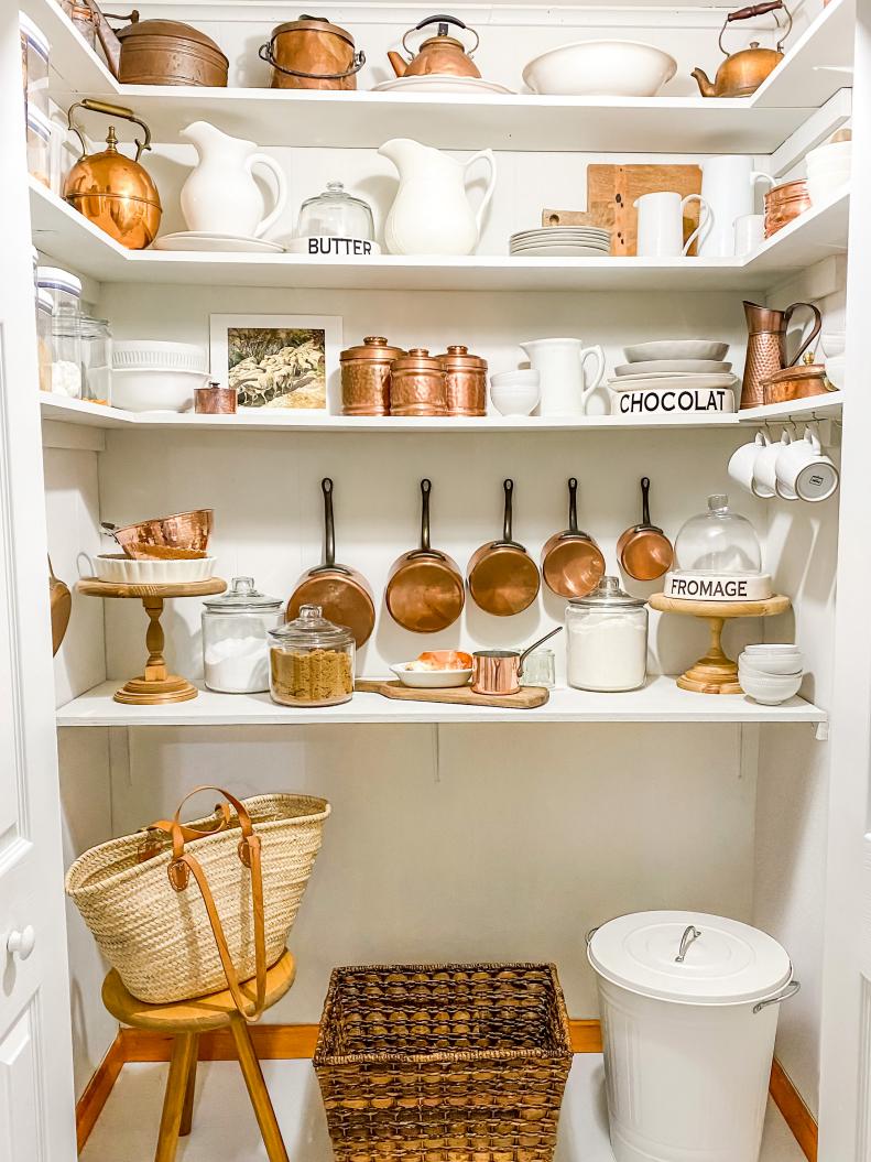 It’s a great place to display vintage dishes, glassware, or, in the case of blogger Amy Mings of Maison de Mings, copper pieces. (Her collection started with the set of pots she got on a trip to France). White dishware and glass jars complete the chic neutral palette. Bonus: “Taking sugar and flour out of bags helps us not overbuy,” she says.