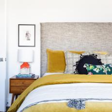 Eclectic Bedroom With Yellow Duvet