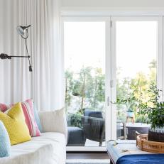 Eclectic Living Room With Yellow Pillow