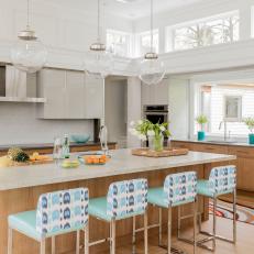 Neutral Transitional Kitchen With Blue Barstools