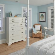 Blue-and-White Guest Bedroom With Views of the Water